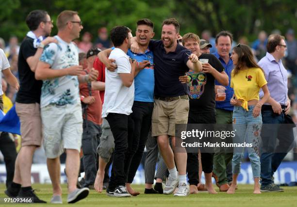 Scotland fans invade the field as Scotland beat England by 6 runs during the One Day International match between Scotland and England at The Grange...