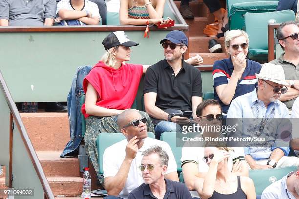 Clive Owen, Marion Cotillard, Guillaume Canet and Melita Toscan du Plantier attend the Men Final of the 2018 French Open - Day Fithteen at Roland...