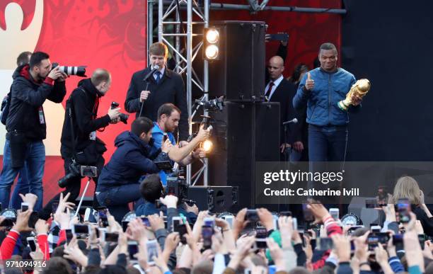 Marcel Desailly brings out the FIFA World Cup trophy during the official opening of the FIFA Fan Fest at Vorobyovy Gory on June 10, 2018 in Moscow,...