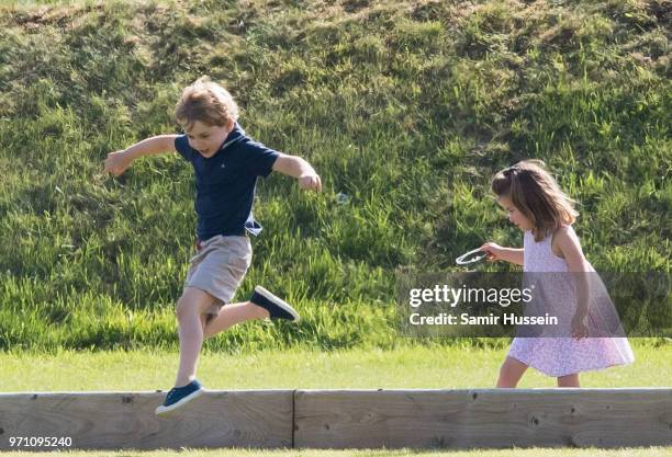 Prince George of Cambridge and Princess Charlotte of Cambridge attend the Maserati Royal Charity Polo Trophy at Beaufort Park on June 10, 2018 in...