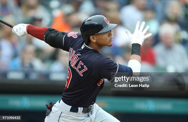 Erik Gonzalez of the Cleveland Indians doubles to deep centerfield with the bases loaded scoring Lonnie Chisenhall, Melky Cabrera and Roberto Perez...