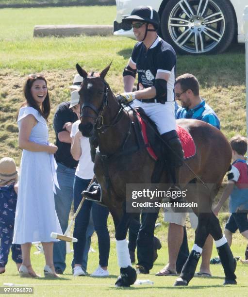 Catherine, Duchess of Cambridge and Prince William, Duke of Cambridge attend the Maserati Royal Charity Polo Trophy at Beaufort Park on June 10, 2018...