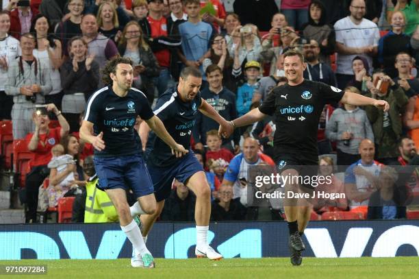 Paddy McGuinness and Blake Harrison warm-up prior to kick off during Soccer Aid for Unicef 2018 at Old Trafford on June 10, 2018 in Manchester,...