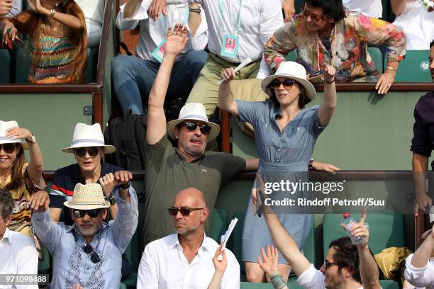 Actor Jean Dujardin and his wife Ice kater Nathalie Pechalat attend the 2018 French Open - Day Fifteen at Roland Garros on June 10, 2018 in Paris,...