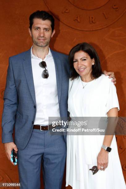 Member of the Cabinet of the Paris City Hall for sports, Pierre Rabadan and Mayor of Paris Anne Hidalgo attend the Men Final of the 2018 French Open...