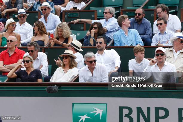 Sidney Toledano, his son Alan Toledano and Jon Bon Jovi attend the Men Final of the 2018 French Open - Day Fithteen at Roland Garros on June 10, 2018...
