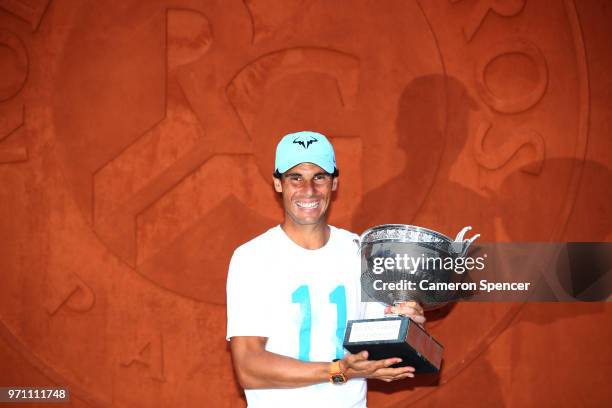 Men's singles winner, Rafael Nadal of Spain poses with the Musketeers' Cup following his mens singles final victory over Dominic Thiem of Austria...