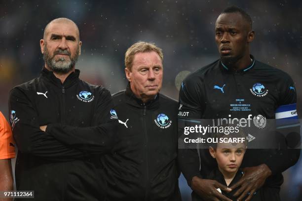 Former French international Eric Cantona, coach Harry Redknapp and Jamaica's Usain Bolt stand before an England v Soccer Aid World XI charity...