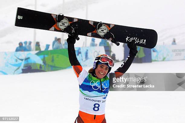 Nicolien Sauerbreij of Netherlands celebrates after winning the gold medal in the Snowboard Ladies' Parallel Giant Slalom on day 15 of the Vancouver...