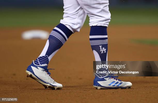 Detailed view of the cleats of Enrique Hernandez of the Los Angeles Dodgers is seen in the eighth inning during the MLB game between the Miami...