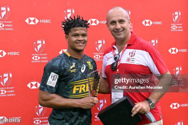 Dewald Human of South Africa pose with HSBC ambassador Philippe Saint Andre for receing the best player of the final award at the HSBC Paris Sevens,...