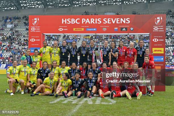 All women teams pose together during the trophy ceremony at the trohpy at the HSBC Paris Sevens, stage of the Rugby Sevens World Series at Stade Jean...