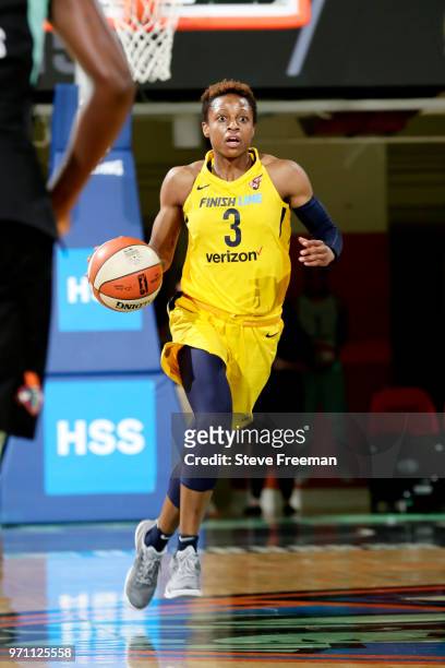 Tiffany Mitchell of the Indiana Fever handles the ball against the New York Liberty on June 10, 2018 at Westchester County Center in White Plains,...