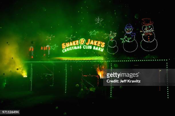 Festivalgoers are seen during 90s Rave by Full Service Party at Snake & Jake's Christmas Club Barnduring day 4 of the 2018 Bonnaroo Arts And Music...