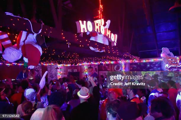 Festivalgoers are seen during 90s Rave by Full Service Party at Snake & Jake's Christmas Club Barnduring day 4 of the 2018 Bonnaroo Arts And Music...