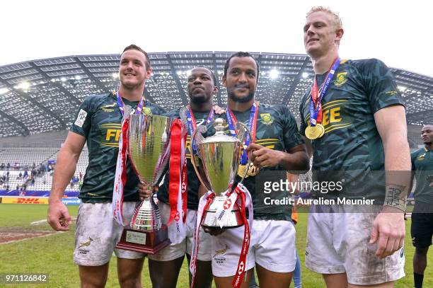 South Africa players pose with the trophy after winning the series championship at the HSBC Paris Sevens, stage of the Rugby Sevens World Series at...