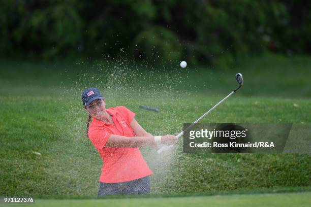 Kristen Gillman of the United States team plays a shot from a bunker on the 14th hole during the singles matches on day three of the 2018 Curtis Cup...