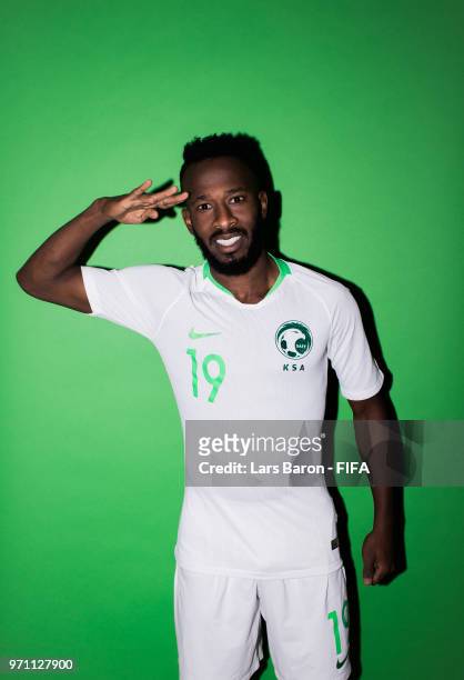 Fahad Almuwallad of Saudi Arabia poses for a portrait during the official FIFA World Cup 2018 portrait session on June 10, 2018 in Saint Petersburg,...
