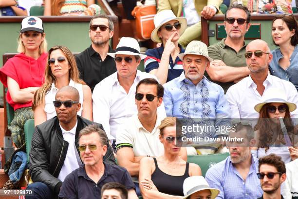 Back row, left to right: French actress Marion Cotillard with her French actor husband Guillaume Canet, plus French actor Jean Dujardin and his wife...