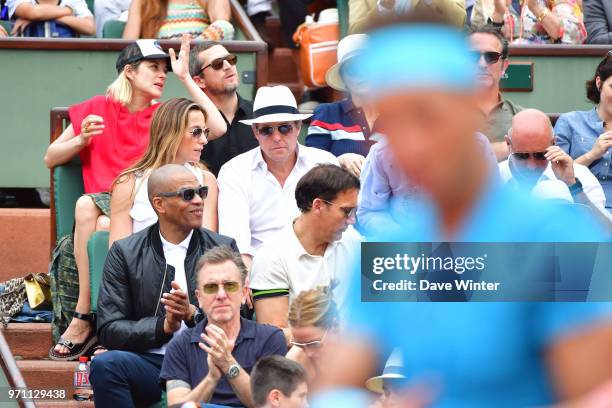 Back row, left to right: French actress Marion Cotillard with her French actor husband Guillaume Canet, plus French actor Jean Dujardin ; second row,...