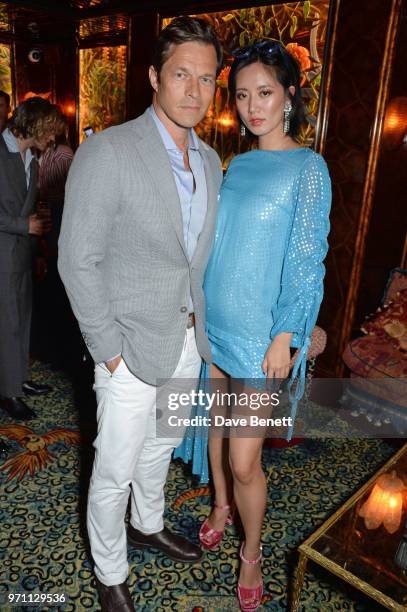Paul Sculfor and Betty Bachz attend the GQ Style and Browns LFWM Party at Annabels on June 10, 2018 in London, England.