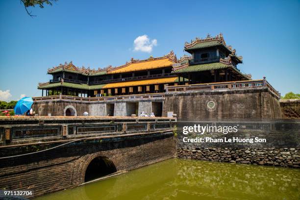 ngọ môn gate - meridian gate of hue - aka the south gate, is the main entrance way of the imperial city huế. located with the citadel of huế - imperial city stock pictures, royalty-free photos & images