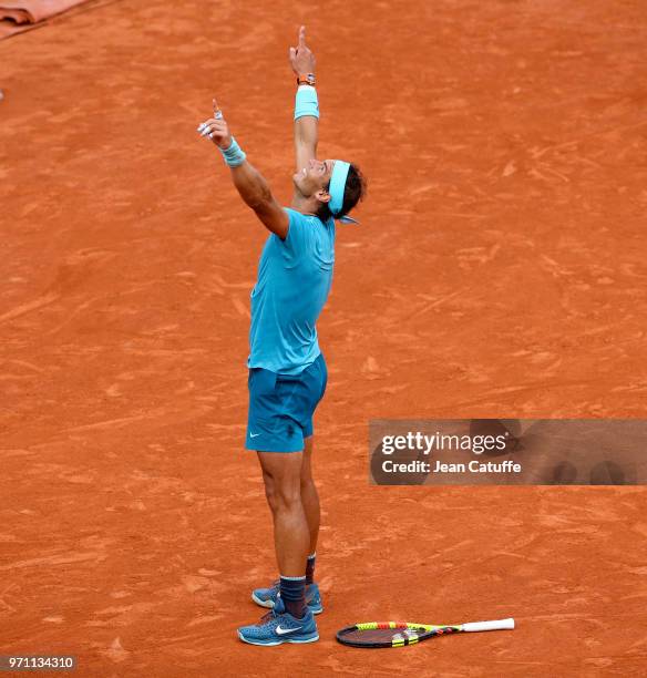 Rafael Nadal of Spain celebrates winning his 11th French Open on Day 15 of the 2018 French Open at Roland Garros stadium on June 10, 2018 in Paris,...