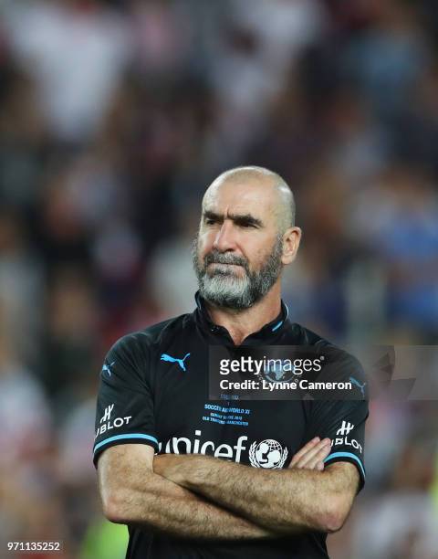 Eric Cantona of the Rest of the World looks on in defeat after the Soccer Aid for UNICEF 2018 match between Englannd and the Rest of the World at Old...