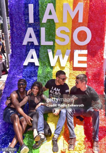 Cast members Toby Onwumere, Tina Desai, Miguel Angel Silvestre, and Brian Smith pose for portrait on top of Sense8 float at LA Pride Music Festival...