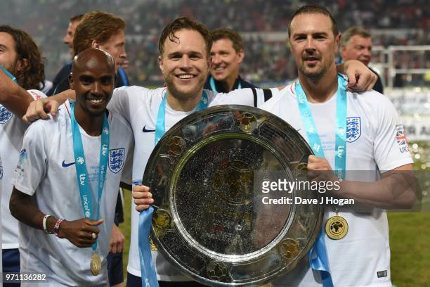 Sir Mo Farah, Blake Harrison, Olly Murs and Paddy McGuinness celebrates after the final whistle during Soccer Aid for Unicef 2018 at Old Trafford on...