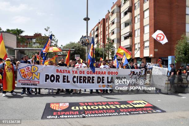 Banner requesting the closure of TV3 is displayed in front of the headquarters of the Public Television of Catalonia. Hundreds of people, fans and...