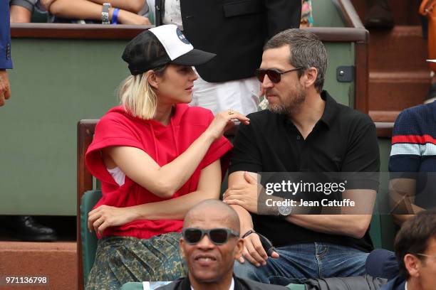 Marion Cotillard, Guillaume Canet during the men's final on Day 15 of the 2018 French Open at Roland Garros stadium on June 10, 2018 in Paris, France.