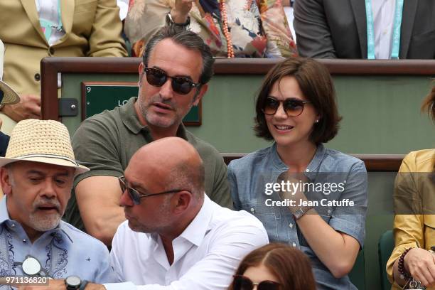 Jean Dujardin, Nathalie Pechalat during the men's final on Day 15 of the 2018 French Open at Roland Garros stadium on June 10, 2018 in Paris, France.