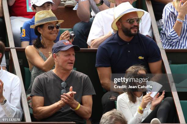 Woody Harrelson, his wife Laura Louie and their daughter Makani Harrelson during the men's final on Day 15 of the 2018 French Open at Roland Garros...