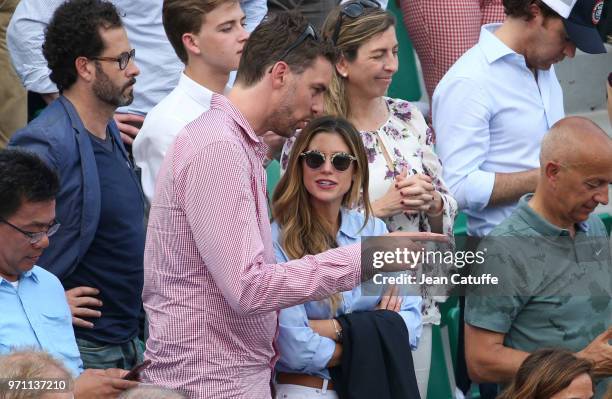 Pau Gasol and girlfriend Catherine McDonnell during the men's final on Day 15 of the 2018 French Open at Roland Garros stadium on June 10, 2018 in...