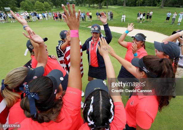 The United States team celebrate after their 17-3 victory over the Gtreat Britain and Ireland team during the final day singles matches in the 2018...
