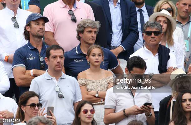 Carlos Moya, Coach of Rafael Nadal of Spain with his agent, Carlos Costa and his uncle Toni Nadal during the men's final on Day 15 of the 2018 French...
