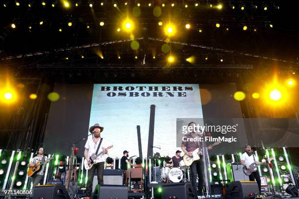 John Osborne and T.J. Osborne of Brothers Osborne perform on What Stage during day 4 of the 2018 Bonnaroo Arts And Music Festival on June 10, 2018 in...