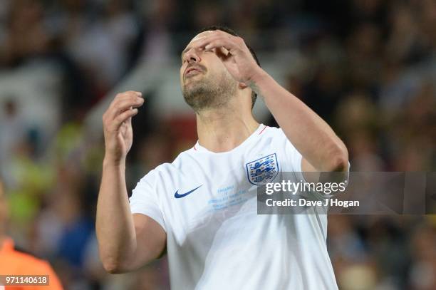 Paddy McGuinness reacts as he misses a penalty during Soccer Aid for Unicef 2018 at Old Trafford on June 10, 2018 in Manchester, England.