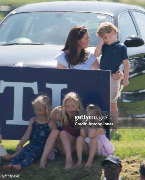 Savannah Phillips, Princess Charlotte of Cambridge, Catherine Duchess of Cambridge and Prince George of Cambridge attend the Maserati Royal Charity...