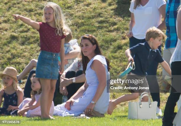 Savannah Phillips, Princess Charlotte of Cambridge, Prince George of Cambridge and Catherine, Duchess of Cambridge attend the Maserati Royal Charity...