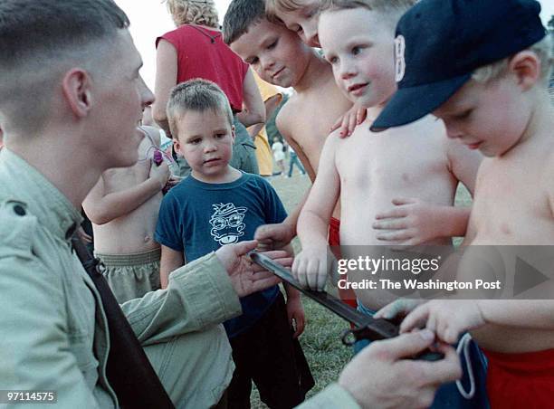 Fort Meade, Maryland--PHOTOGRAPHER-MARVIN JOSEPH/TWP- PICTURED, Specialist Josh Kelley shows off a World War One Springfield Rifle with a 15 inch...