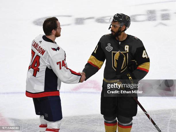John Carlson of the Washington Capitals and Pierre-Edouard Bellemare of the Vegas Golden Knights shake hands after Game Five of the 2018 NHL Stanley...
