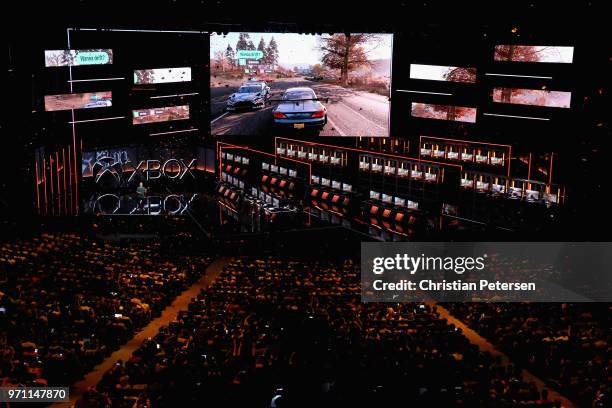 Ralph Fulton, Creative Director at Playground Games, introduces 'Forza Horizon 4' during the Microsoft xBox E3 briefing at the Microsoft Theater on...