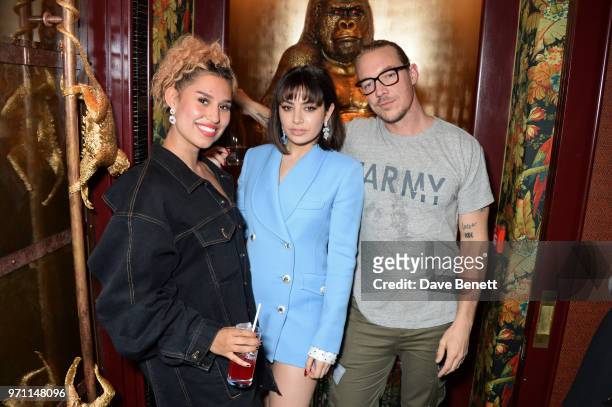 Raye, Charli XCX and Diplo attend the GQ Style and Browns LFWM Party at Annabels on June 10, 2018 in London, England.