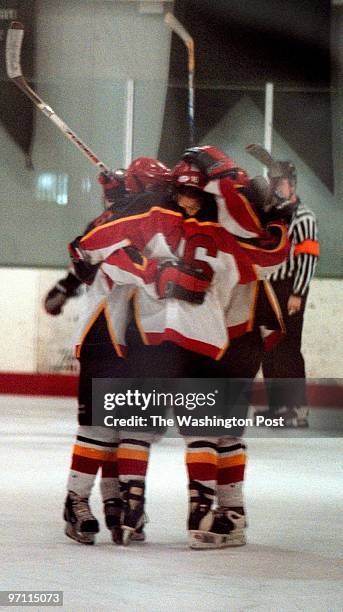 Laurel Ice House--PHOTOGRAPHER-MARVIN JOSEPH/TWP--CAPTION-Terps Hockey team versus Virginia Tech. PICTURED, The Terps have a group hug after scoring...