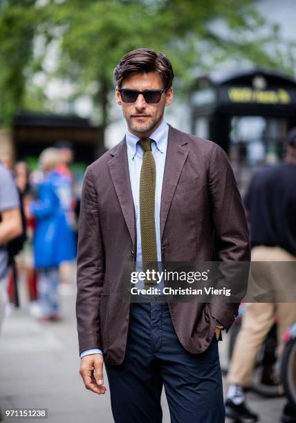 Johannes Huebl is seen during London Fashion Week Men's June 2018 on June 10, 2018 in London, England.