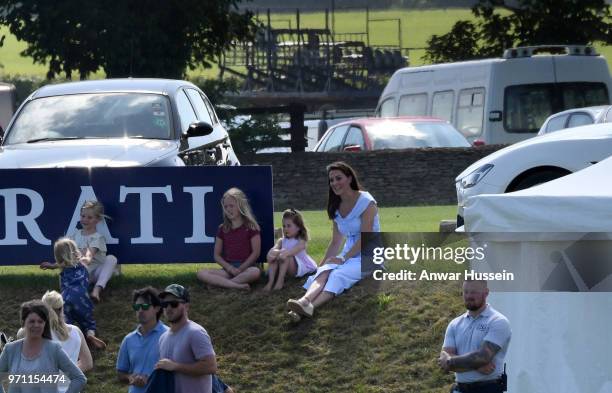 Catherine, Duchess of Cambridge with Princess Charlotte of Cambridge and Savannah Phillips during the Maserati Royal Charity Polo on June 10, 2018 in...