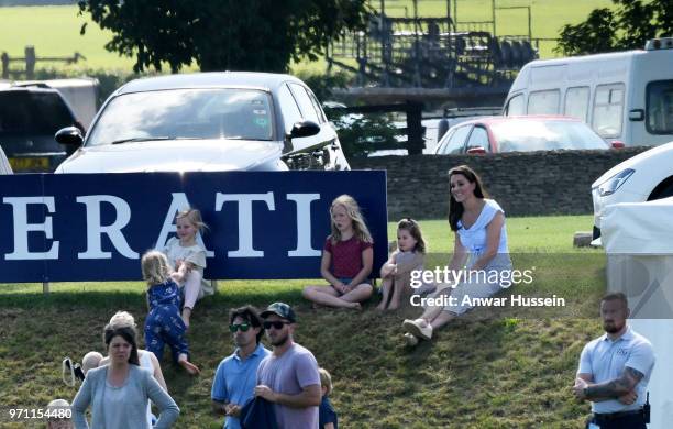 Catherine, Duchess of Cambridge with Princess Charlotte of Cambridge and Savannah Phillips during the Maserati Royal Charity Polo on June 10, 2018 in...