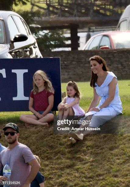 Catherine, Duchess of Cambridge with Princess Charlotte of Cambridge and Savannah Phillips during the Maserati Royal Charity Polo on June 10, 2018 in...